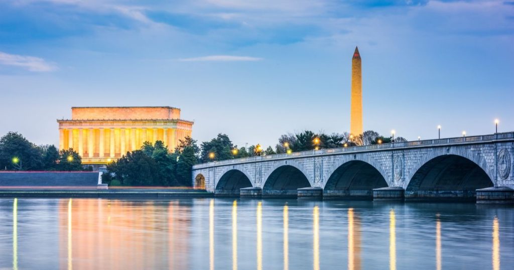 Evening view of the Washington Monument and Lincoln Memorial along the Potomac River near Southwest Waterfront, Washington DC.